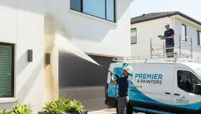 Professional pressure cleaning a Salt Lake City home exterior for improved curb appeal and paint protection